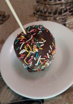 Una foto de Manzanas con chocolate 🍫🍎