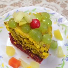 A picture of Red Velvet and Nuts cake with Warm Cocktail syrup dressing.