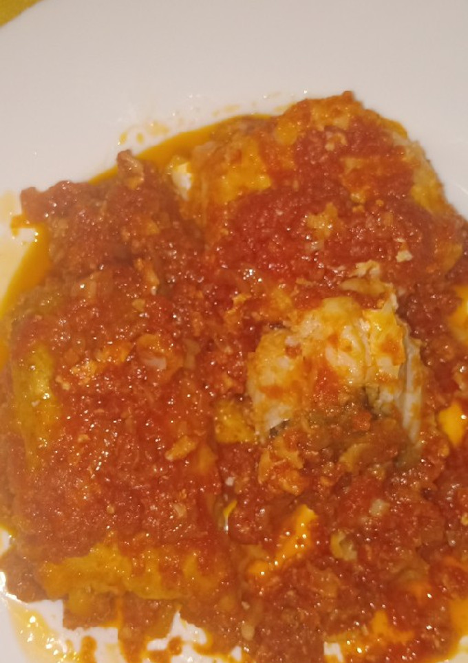 Una foto de Bacalao con tomate