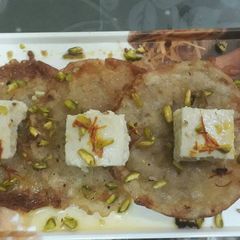 A picture of Coconut malpua.