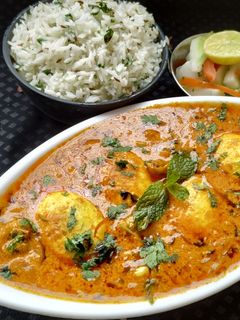 रेस्टॉरंट स्टाईल अंडा करी (anda curry recipe in marathi) रेसिपी चे मुख्य फोटो