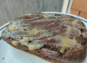 Una foto de Torta🍰de banano🍌,cacao🍫y dulce🍯de leche🍌🥛
