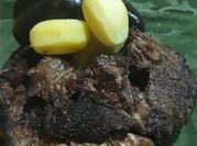 Una foto de morcilla con guarnicion
