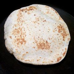 Wheat flour pitta bread A picture of Wheat flour pitta bread.