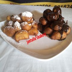 A picture of Dusted/glazed puff puff.