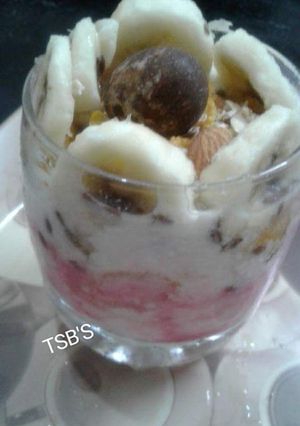 A picture of Granola Yoghurt Fruits & Nuts Parfait.