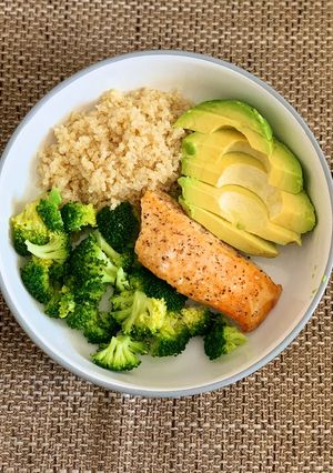 A picture of Salmon Quinoa Broccoli Avocado Bowl.