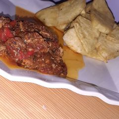 A picture of Fried sweet potatoes and fish sauce.