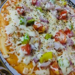 A picture of Veg Loaded Pizza (Snack).