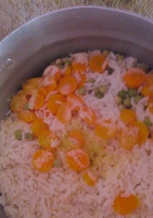 A picture of Rice with veggies.