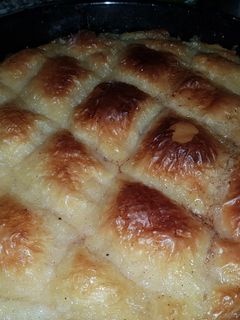 صورة لوصفة بقلاوة بقشطة وفول سوداني