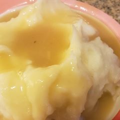 Vegan mashed potatoes and gravy A picture of Vegan mashed potatoes and gravy.