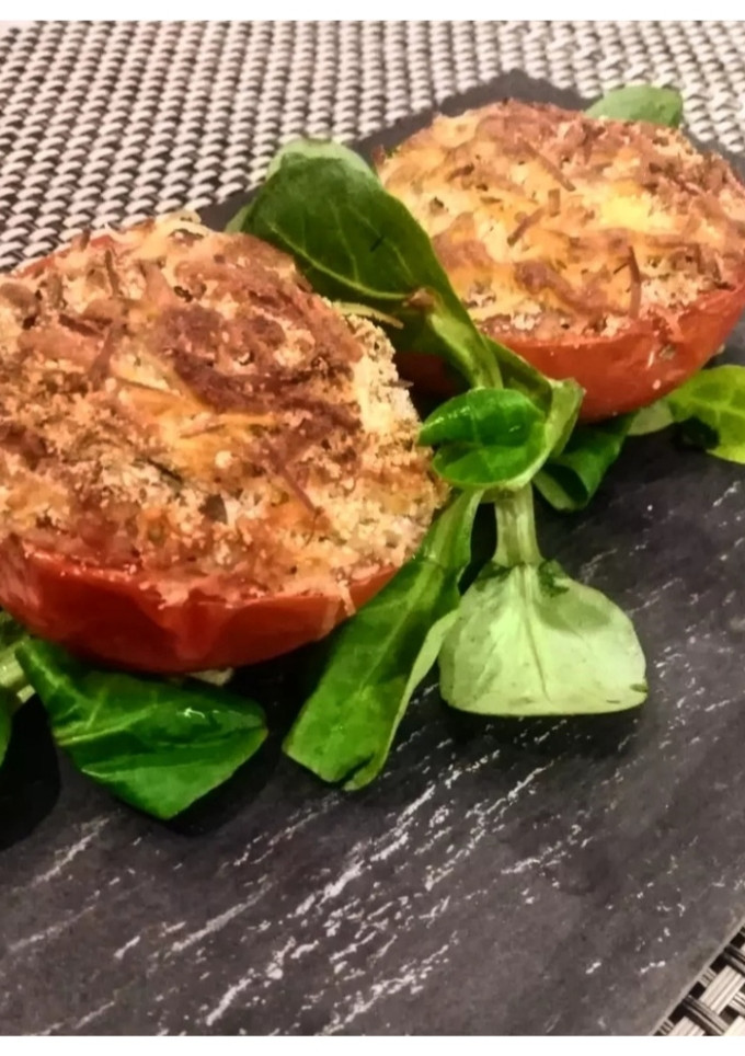 Una foto de Tomates gratinados al horno
