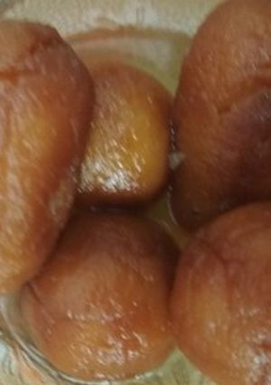 A picture of Bread Gulab Jamun stuffed with dry fruits.