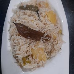 A picture of Black cumin Aloo ka pulao with chicken stock.