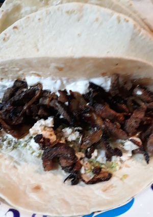 A picture of Onions, Beef, and Tortillas.