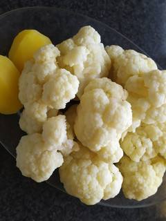 Una foto de Coliflor cocida con mahonesa
