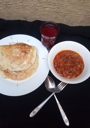 A picture of Meaty sinasir wit Onion sauce.