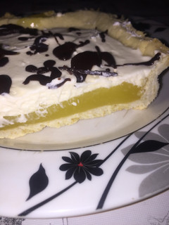 Una foto de Tarta frutal de naranjas y chantilly