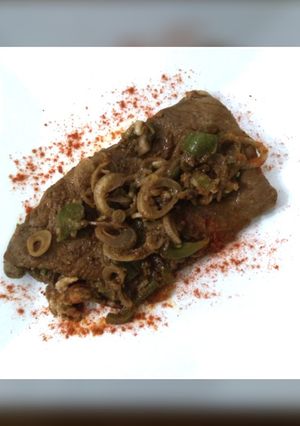 Una foto de Bife de Filete con cebollitas de Verdeo