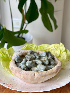 Una foto de Malfatis de espinacas en salsa cuatro quesos y el toque, sale en cazuela de masa madre