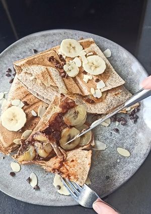 Une photo de Wrap chaud bananes, amandes effilées et pépites de chocolat
