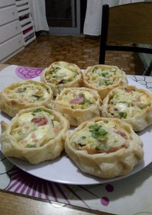 Una foto de Tarteletas de cebolla y queso