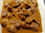 Una foto de lomitos en salsa