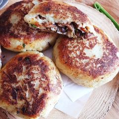 A picture of Mushroom Stuffed Potato Cakes.