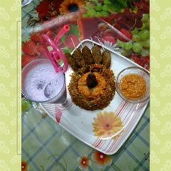 A picture of Presenting fried rice lollipop with blueberry milkshake.