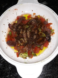 Una foto de Trinxat de verduras frescas con semillas de lino