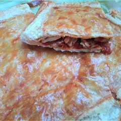 รูปของ Empanada de bacalao y pimientos asados