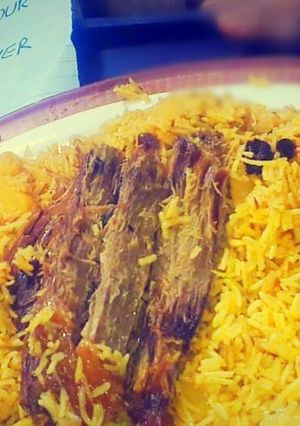 A picture of Zafrani rice with meat.