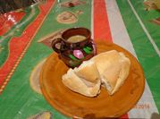 Una foto de atole de maiz con piloncillo