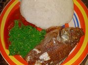 A picture of fried fish with ugali