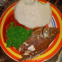 A picture of Fried Fish sukuma ugali.