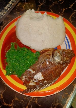 A picture of Fried Fish sukuma ugali.