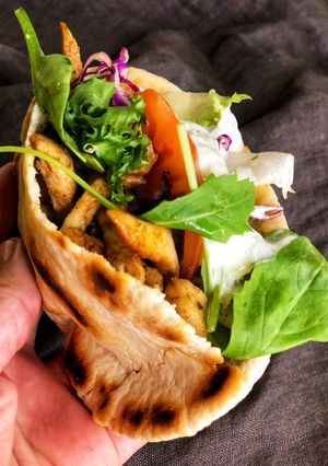 A picture of Chicken Gyros in Pita Bread.