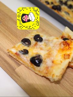 صورة لوصفة بيتزا رقيقه لذيذه
