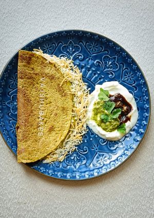 A picture of Green Moong & Spinach Pancakes (Mug - palak dhirde).