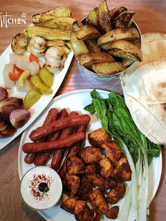 A picture of Arabic Chicken Kebabs with Herbed Potatoes.