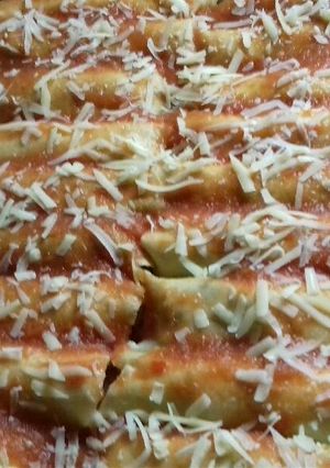 Una foto de Canelones de pollo y espinaca