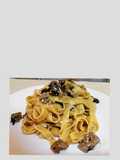 Tagliatelle with Porcini Mushrooms, Speck, and Sausage