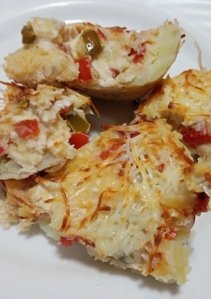 Una foto de Patatas rellenas con pollo y pimientos