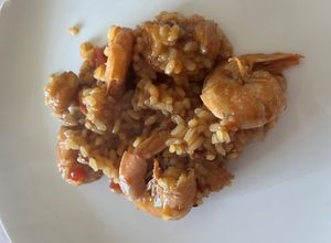 Una foto de Arroz meloso con rape, cola de gambón y pimiento choricero