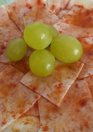 Foto principal de Jamón braseado con pimentón dulce y uvas