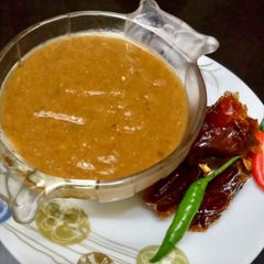 A picture of Hot and sweet tamarind sauce.