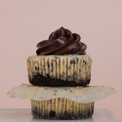 A picture of Mini Oreo Cheesecakes with Chocolate Ganache.