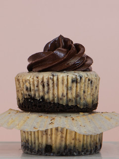 A picture of Mini Oreo Cheesecakes with Chocolate Ganache.