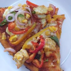A picture of Home made pizza without cheese.